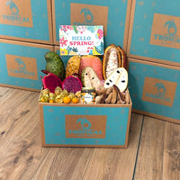Thumbnail for Tropical Fruit Box exotic fruit assortment including dragon fruit, pineapple, soursop, cherimoya, tamarind, and honey.