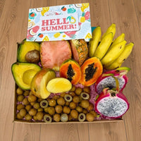 Thumbnail for Tropical Fruit Box assortment featuring pink pineapple, dragon fruit, mango, avocado, bananas, and lychee in a gift box