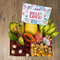 Thumbnail for Tropical Fruit Box assortment featuring mango, pineapple, avocado, dragon fruit, bananas, and longans with a gift card